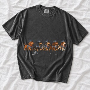 Illustrated dachshunds in conductor hats lined up like a train, text Doxie Express