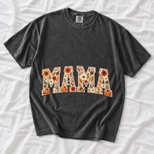 Arched varsity word MAMA filled with fall flowers and acorns in cream, rust and mustard