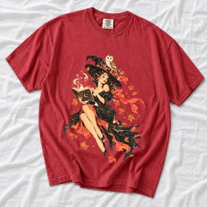 Retro 1950s pin-up witch floating while reading a spell book with an owl on her hat, autumn leaves