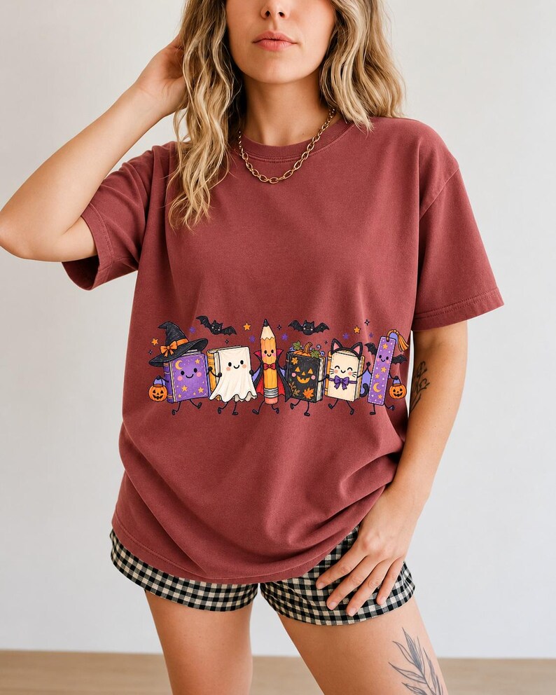 Kawaii books, pencil and bookmark with faces in Halloween costumes, pastel purple and orange