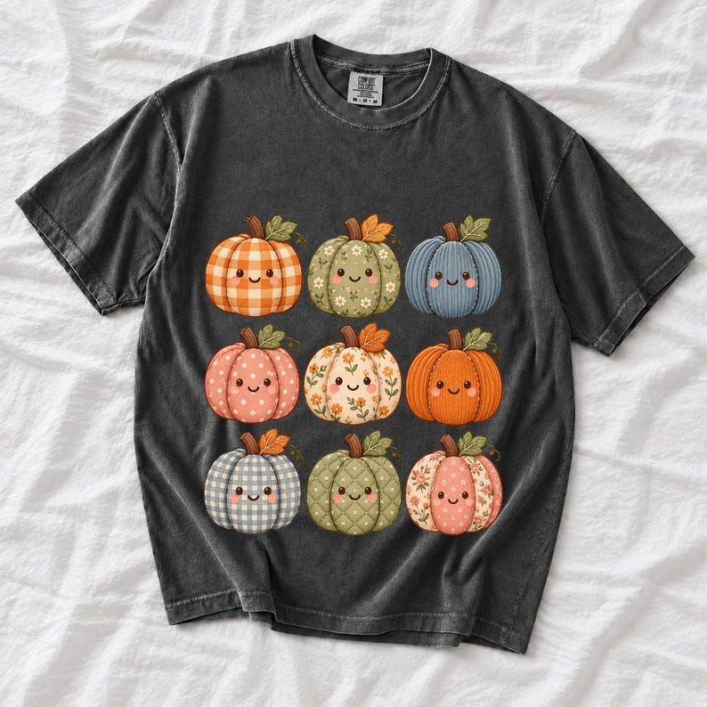 Grid of smiling pumpkins sewn from gingham, floral and corduroy patchwork fabric in autumn colors