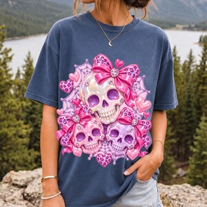 Puffy glossy 3D pink skulls with bows, hearts, cobwebs and rhinestones in coquette style