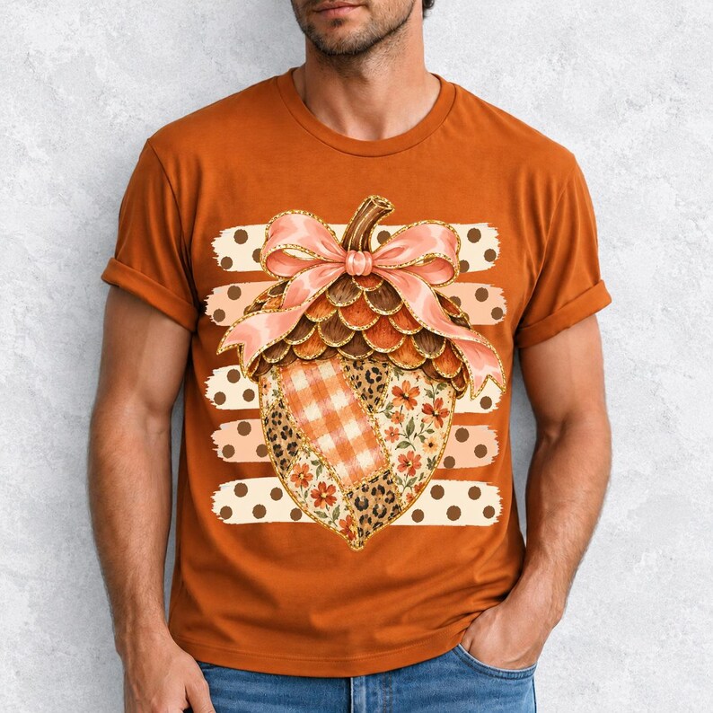 Giant patchwork acorn with a pink satin bow made of plaid, leopard and floral fabric on polka-dot stripes