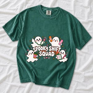 Four kawaii ghosts with stethoscope, bandages, coffee and clipboard, text Spooky Shift Squad