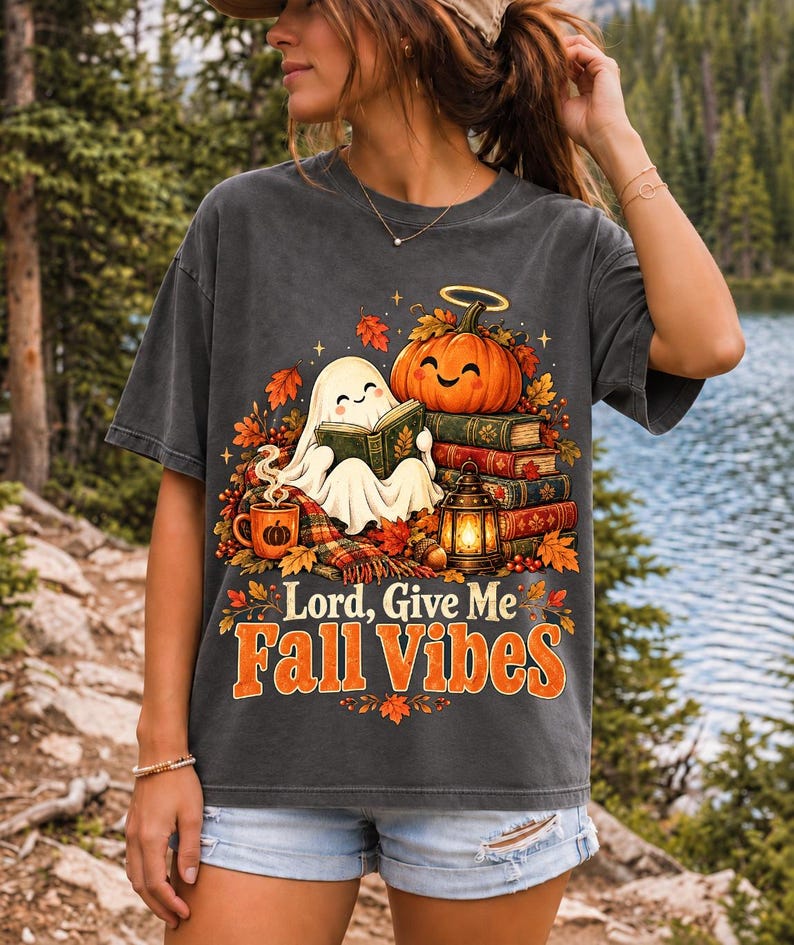 Smiling pumpkin with a halo beside a stack of books and a lantern, text "Lord, Give Me Fall Vibes", retro fall illustration