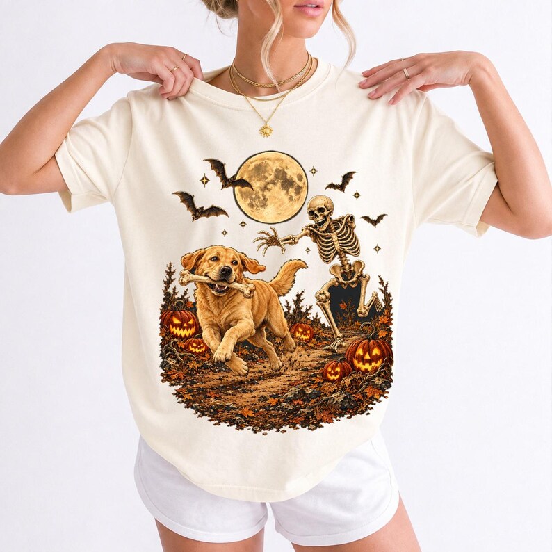 A skeleton chasing a golden labrador that stole its arm bone under a full moon with jack o lanterns and bats