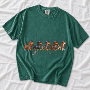Illustrated dachshunds in conductor hats lined up like a train, text Doxie Express