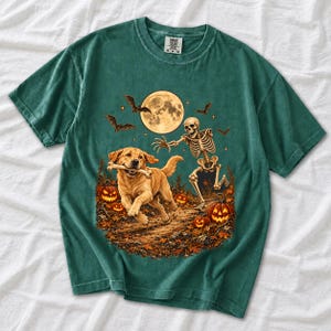 A skeleton chasing a golden labrador that stole its arm bone under a full moon with jack o lanterns and bats