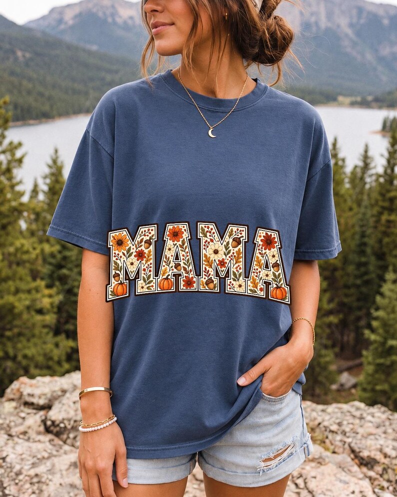Arched varsity word MAMA filled with fall flowers and acorns in cream, rust and mustard