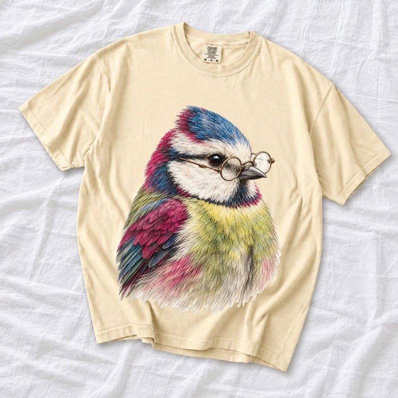 Colored-pencil blue tit bird wearing tiny round reading glasses, funny birdwatcher t-shirt illustration