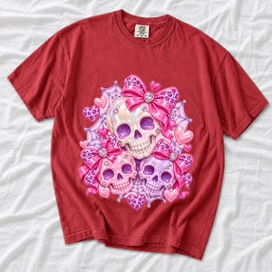 Puffy glossy 3D pink skulls with bows, hearts, cobwebs and rhinestones in coquette style