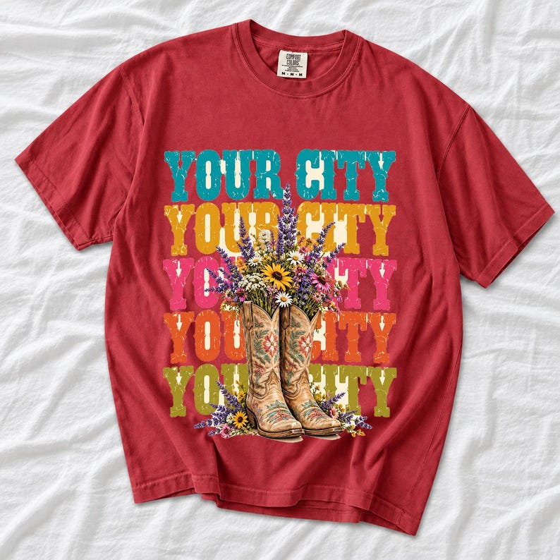 Tan cowboy boots with lavender and wildflowers over a five-line stacked personalized city word in retro colors