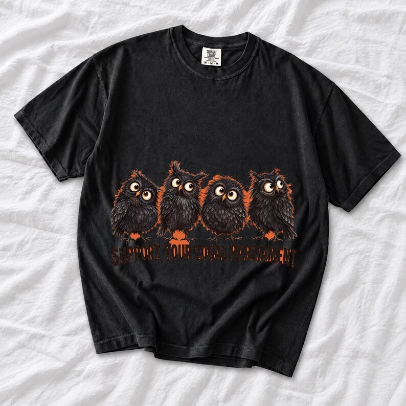 Four fluffy big-eyed black owls in a row with the text "Support Your Local Parliament"