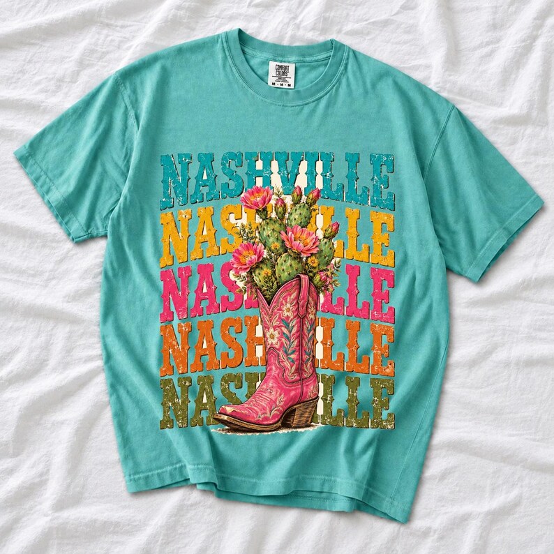 Pink embroidered cowboy boot with blooming cactus over a five-line stacked NASHVILLE word in retro colors