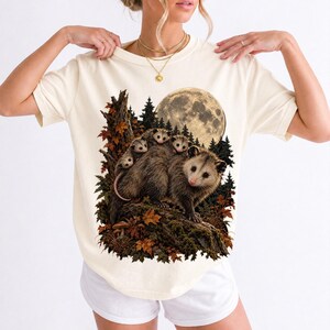 Mother opossum with babies on her back under a full moon and autumn leaves, dark realistic woodland illustration