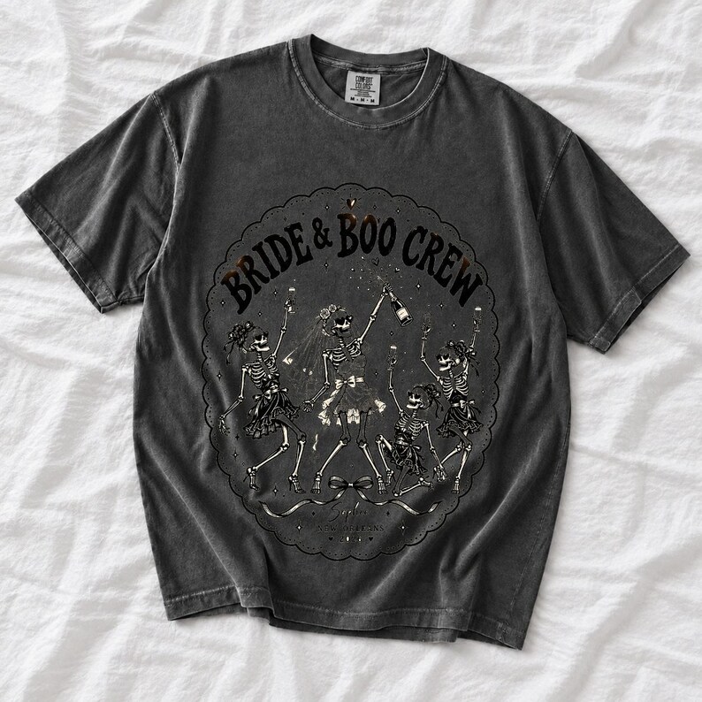 Skeleton bride popping champagne with cheering skeleton bridesmaids and the text Bride & Boo Crew