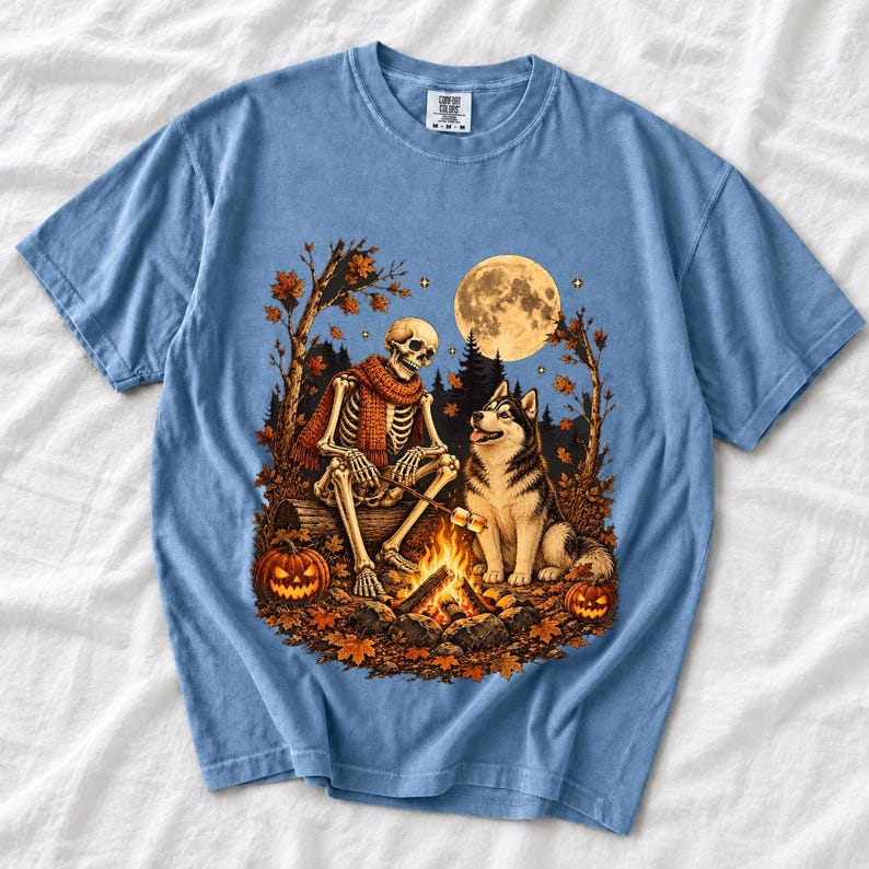 A skeleton in a scarf roasting marshmallows by a campfire beside a husky in an autumn forest under a full moon