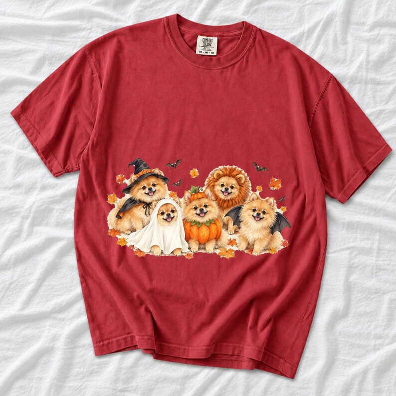 Five fluffy watercolor pomeranians in Halloween costumes with autumn leaves and bats