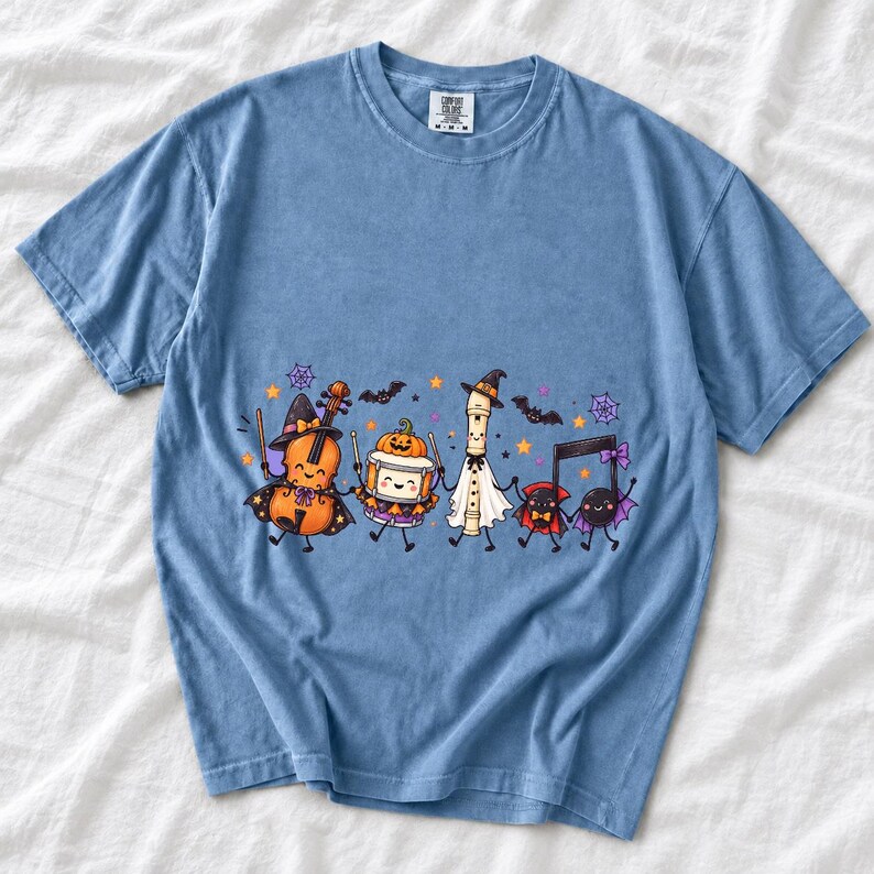 Kawaii violin, drum, recorder and notes with faces in Halloween costumes, pastel purple and orange