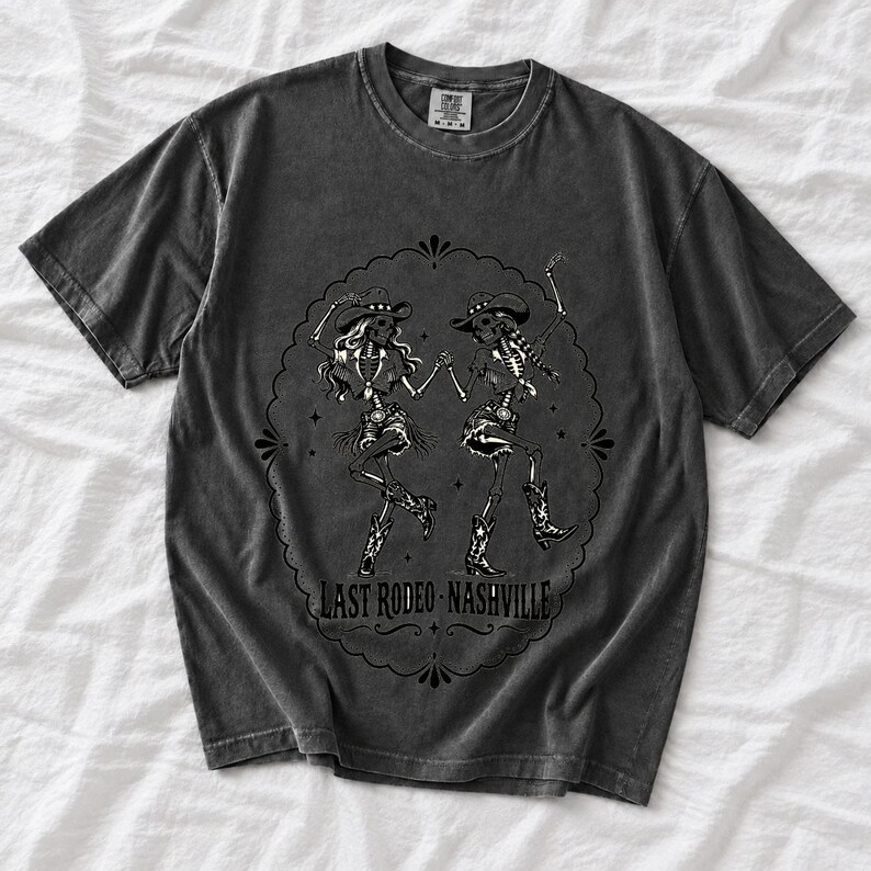 Two cowgirl skeletons in hats line dancing in a starry frame with the text Last Rodeo Nashville