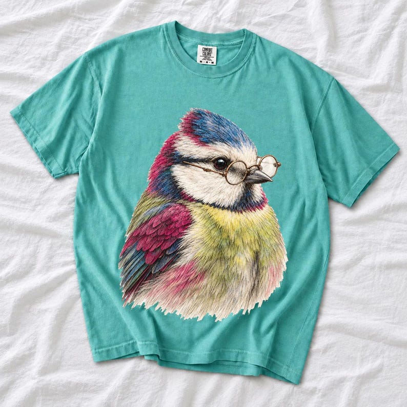 Colored-pencil blue tit bird wearing tiny round reading glasses, funny birdwatcher t-shirt illustration