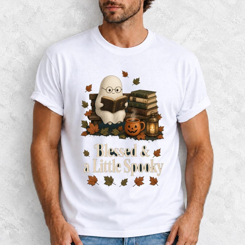 Cute ghost with glasses reading a Bible with a candle and mug, text "Blessed & a Little Spooky", retro fall illustration