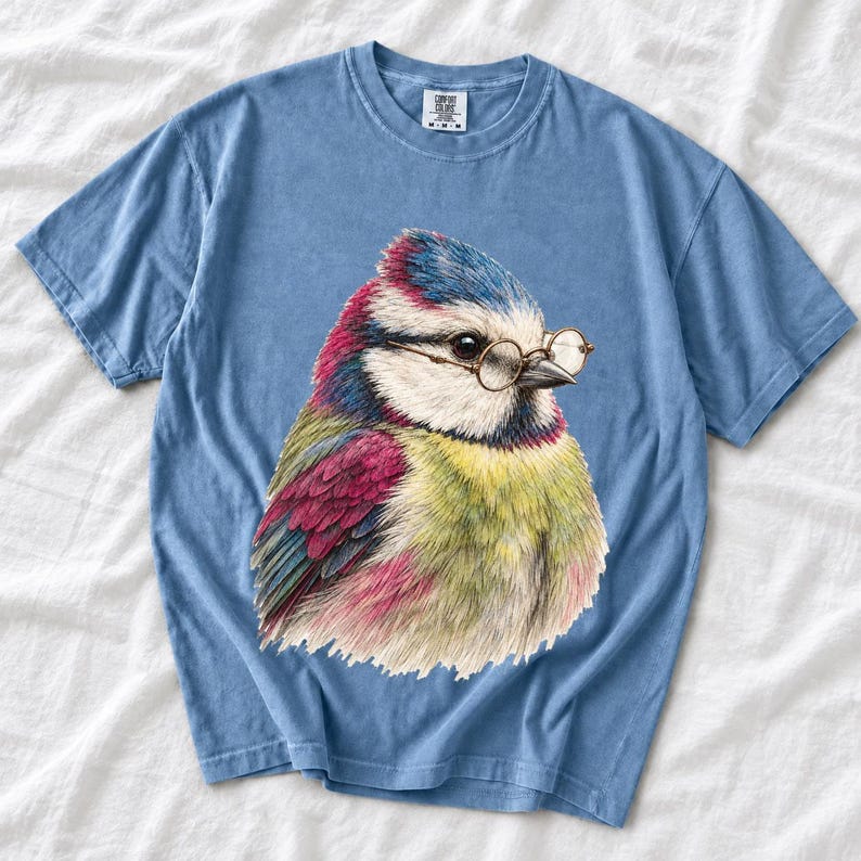 Colored-pencil blue tit bird wearing tiny round reading glasses, funny birdwatcher t-shirt illustration