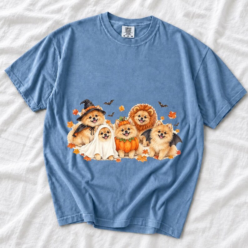 Five fluffy watercolor pomeranians in Halloween costumes with autumn leaves and bats