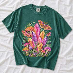 Retro 70s psychedelic glitter crystal cluster with moths and small frogs in pink, mustard, violet and mint