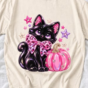 Puffy 3D black cat with a leopard bow beside a glossy pumpkin and stars in coquette style