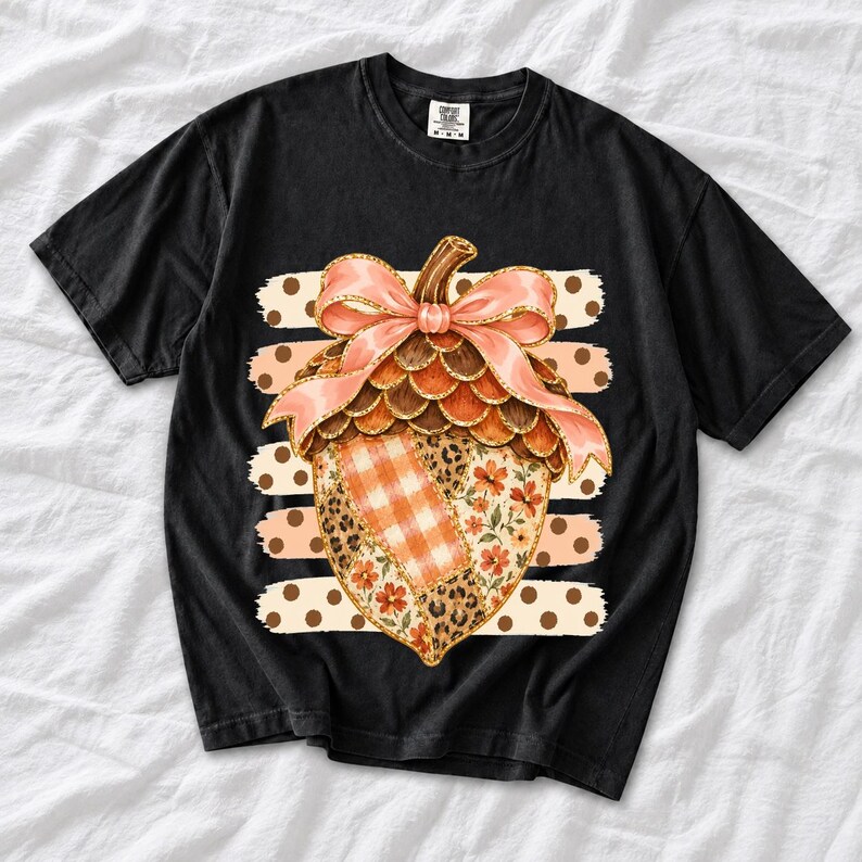 Giant patchwork acorn with a pink satin bow made of plaid, leopard and floral fabric on polka-dot stripes