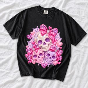 Puffy glossy 3D pink skulls with bows, hearts, cobwebs and rhinestones in coquette style