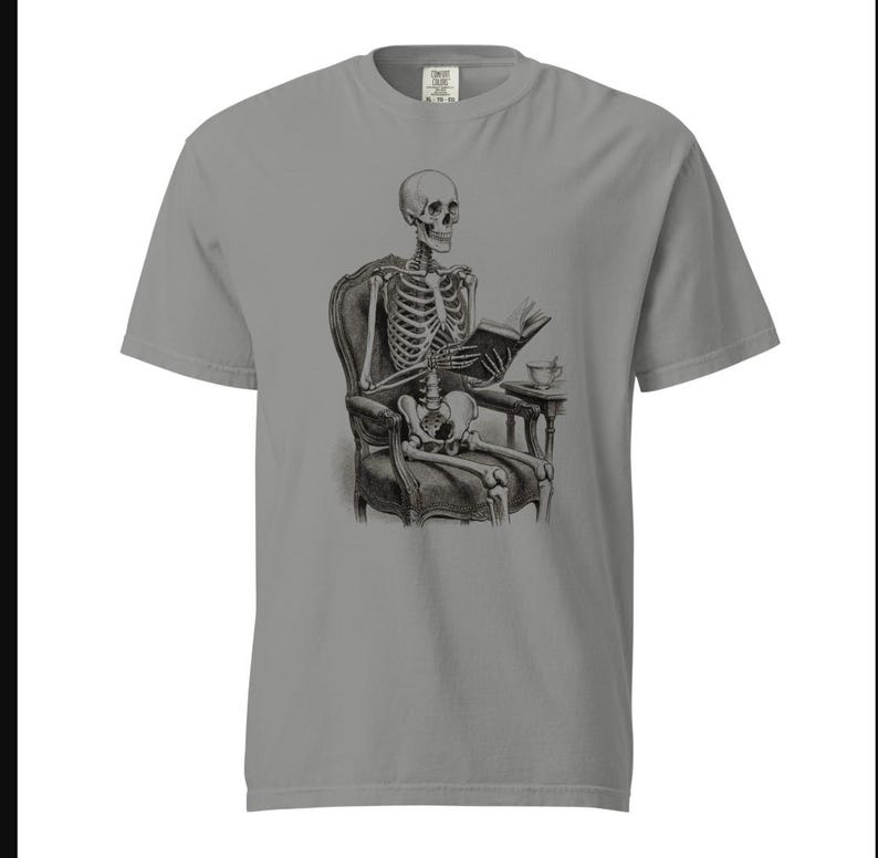 Skeleton Reading Book T-Shirt by AeroBeloved