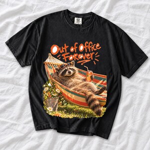 Raccoon relaxing in a hammock with a soda can and sunglasses, 90s film photo style, text "Out of Office Forever"