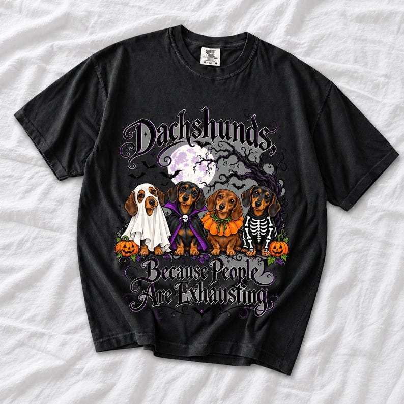 Four dachshunds in Halloween costumes under a spooky tree with text Dachshunds, Because People Are Exhausting