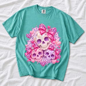 Puffy glossy 3D pink skulls with bows, hearts, cobwebs and rhinestones in coquette style