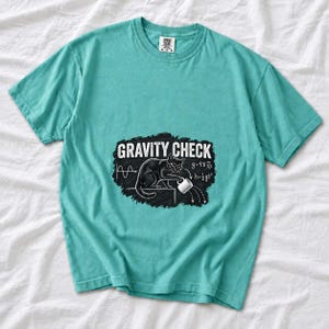 Gravity Check Black Cat Physics Comfort Colors Shirt product mockup, image 6