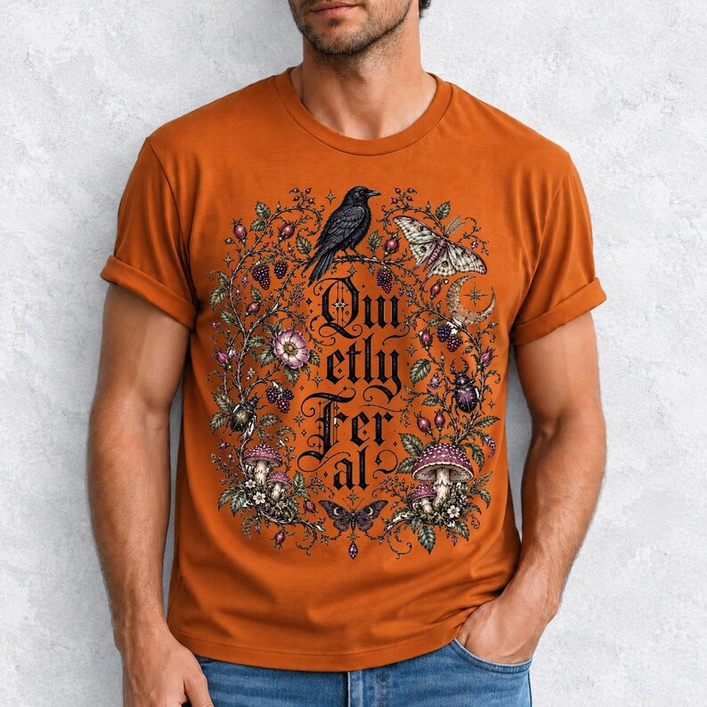 Raven on a wild rose branch with beetles and berries around blackletter text "Quietly Feral"