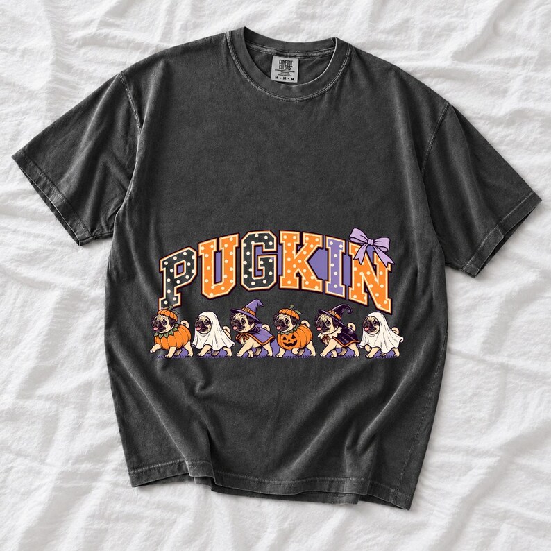 Six pugs in pumpkin, ghost and witch costumes under the arched word PUGKIN, lavender and orange polka-dot varsity style