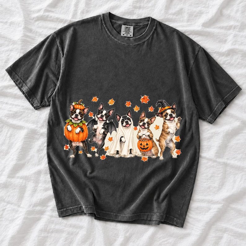 Five watercolor Boston terriers in Halloween costumes with falling autumn leaves