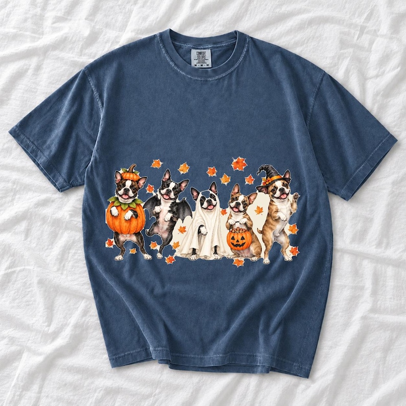 Five watercolor Boston terriers in Halloween costumes with falling autumn leaves