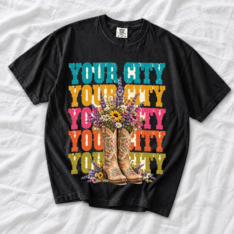 Tan cowboy boots with lavender and wildflowers over a five-line stacked personalized city word in retro colors