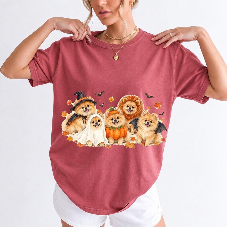 Five fluffy watercolor pomeranians in Halloween costumes with autumn leaves and bats