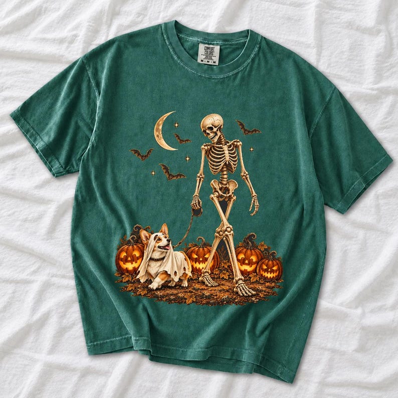 A skeleton walking a corgi in a ghost costume past carved pumpkins under a crescent moon