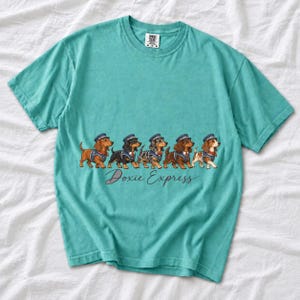 Illustrated dachshunds in conductor hats lined up like a train, text Doxie Express