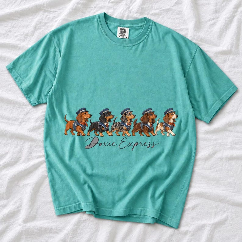 Illustrated dachshunds in conductor hats lined up like a train, text Doxie Express