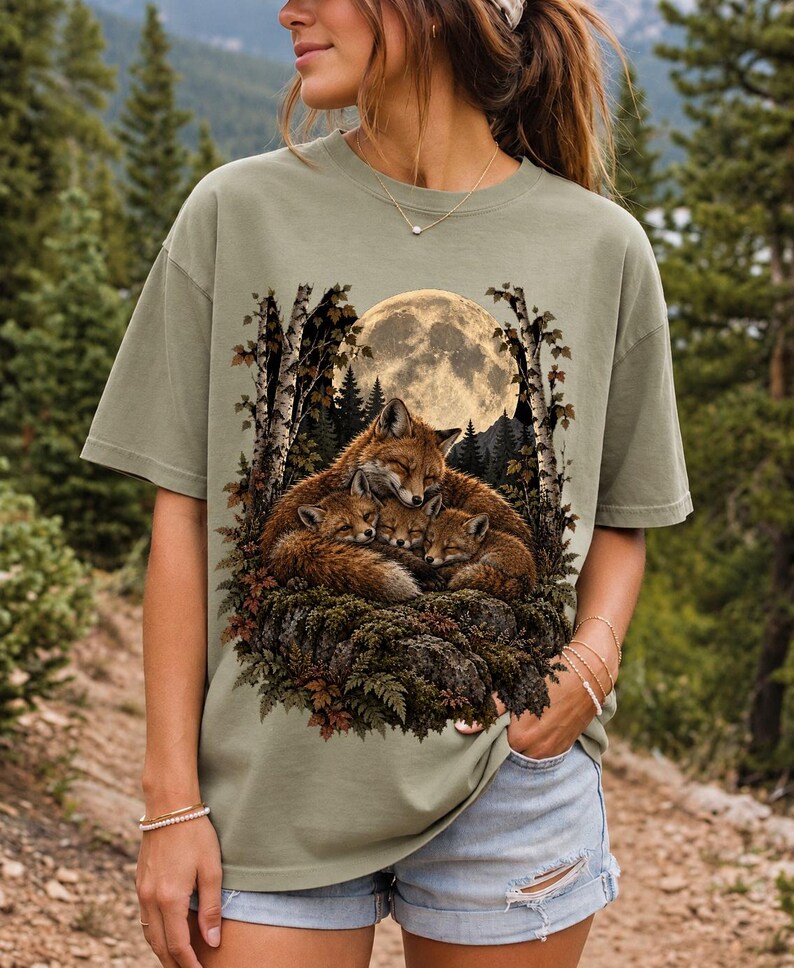 Fox family curled on a rock under a huge full moon among birch trees, dark realistic woodland illustration