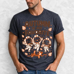 Cute pumpkin characters in nurse caps with clipboards and coffee, text Autumn Is My Favorite Shift