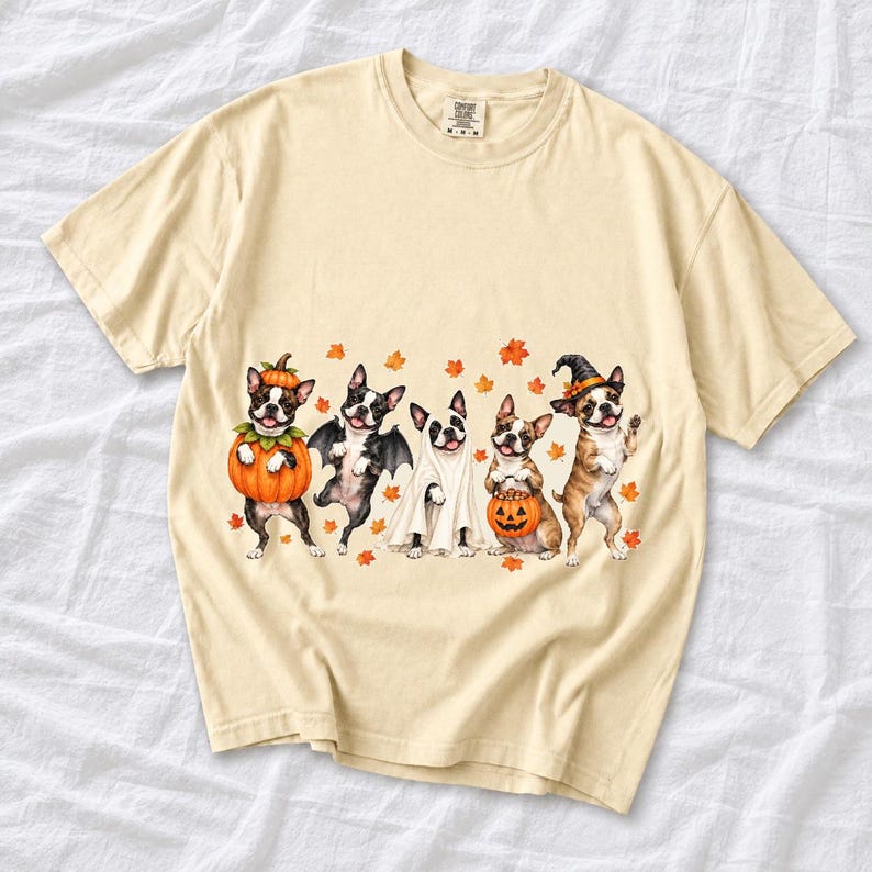 Five watercolor Boston terriers in Halloween costumes with falling autumn leaves