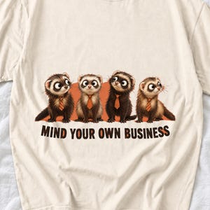 Four ferrets in tiny ties in a row with the text "Mind Your Own Business"